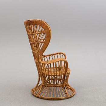 a rattan chair by Gio Ponti & Lio Carminati, Italy, second half of the 20th century.