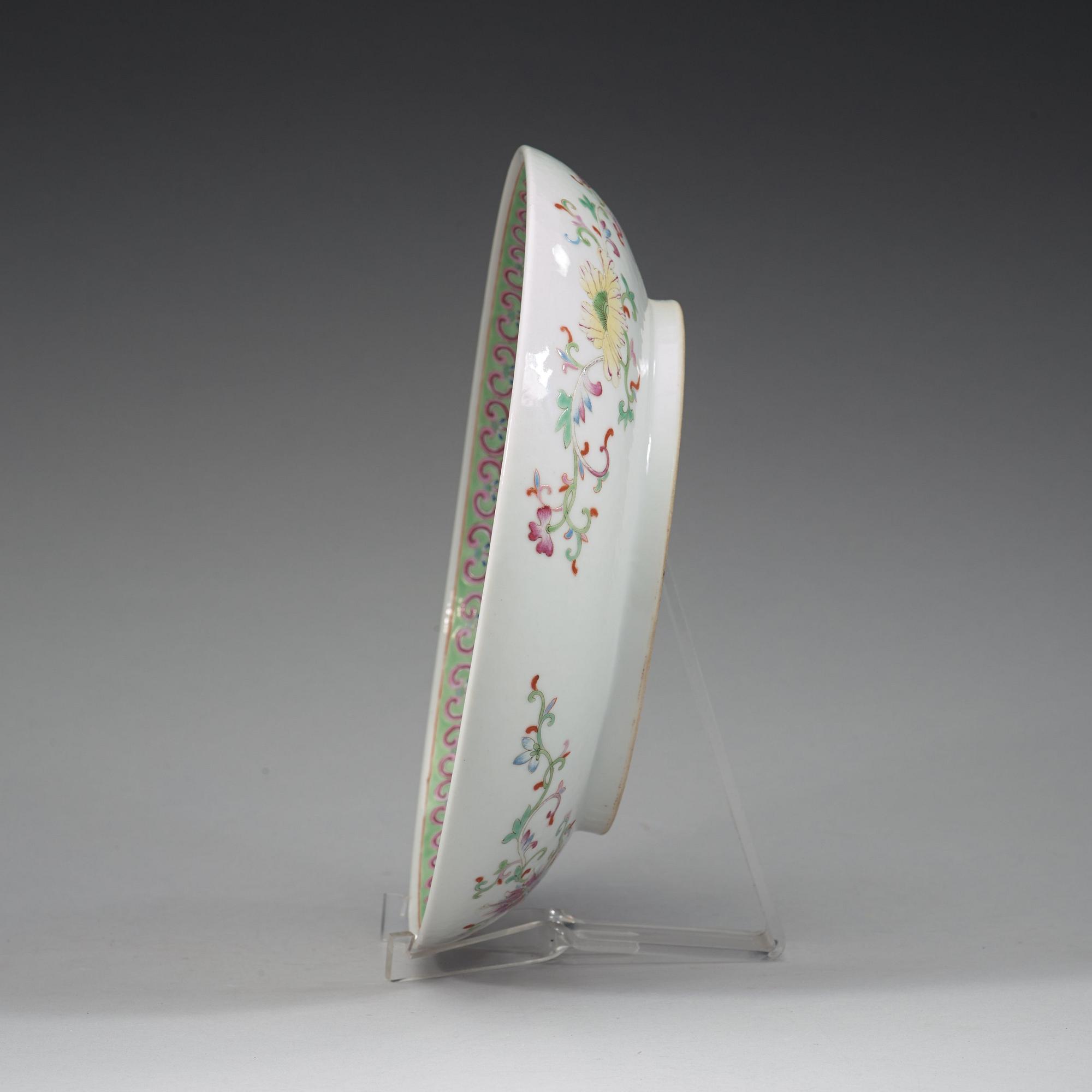 A phoenix and dragon famille rose dish, Qing dynasty, with Guangxu six character mark and period (1875-1908).