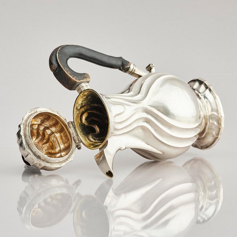 A German 18th century silver coffee-pot, mark of Johan Jacob Loose, Halle (Saale), Sachsen-Anhalt.