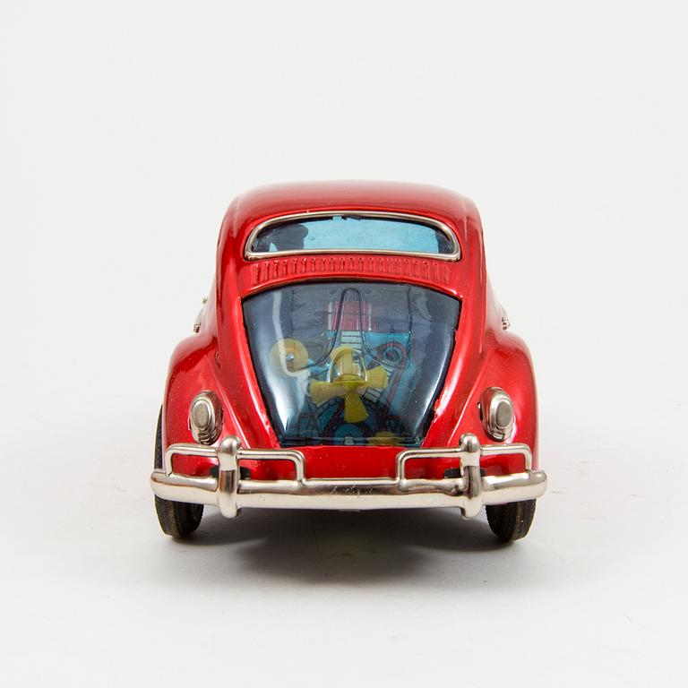 A tinplate Bandai "Volkswagen with openable door", Japan, 1960s.