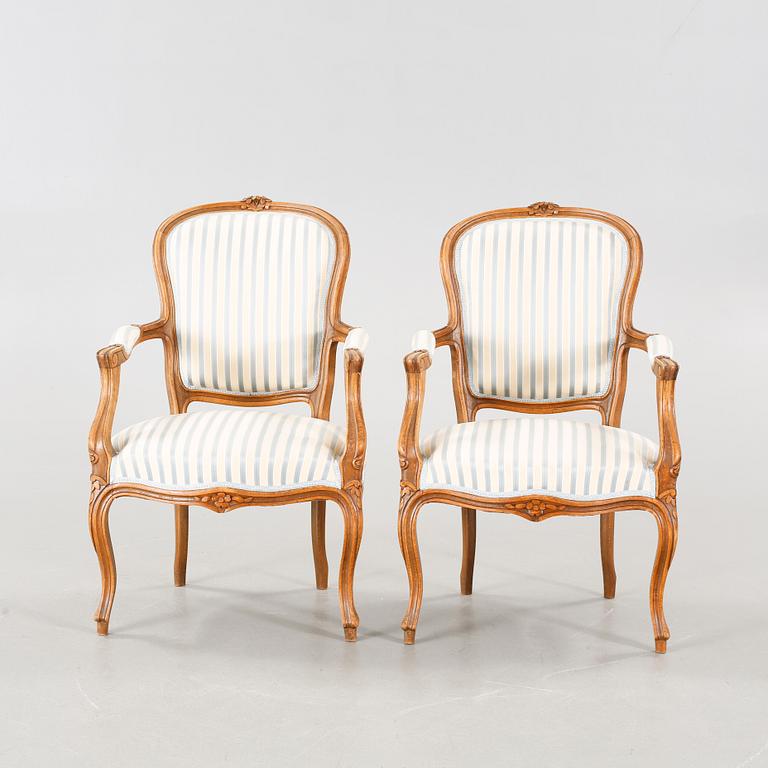 A pair of mid 20th century armchairs.