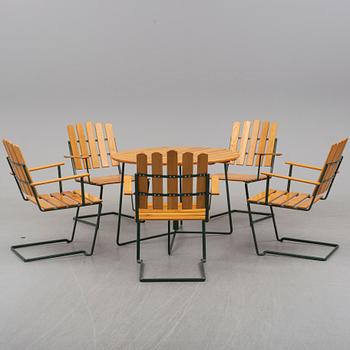 A set of five chairs and a table, Grythyttan, manufactured between 1954 and 1962.