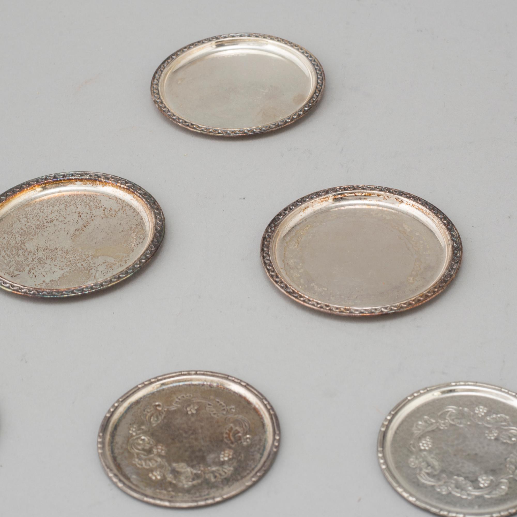 GLASUNDERLÄGG/COASTERS, 11 st, silver. Georg Jensen, sterling, Danmark respektive GAB, Stockholm, 1963-5.