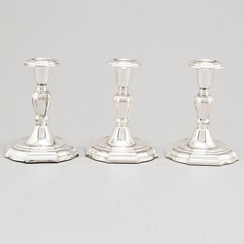 A set of three Swedish silver candlesticks, maker's mark CG Hallberg, Stockholm 1955-1957.