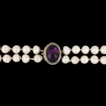 a two strand cultured pearl necklace, 7, 9 mm, amethyst  clasp.