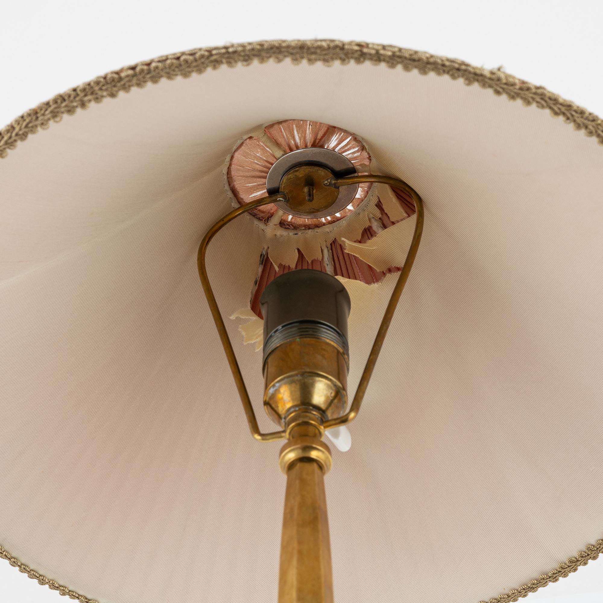 Harald Notini, a Swedish Grace '6851' brass table light, Arvid Böhlmarks Lampfabrik, Stockholm, 1920's.