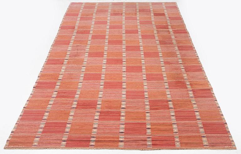 Barbro Nilsson, a carpet, 'Falurutan, röd Borås', flat weave, c. 502 x 212 cm, signed AB MMF BN.