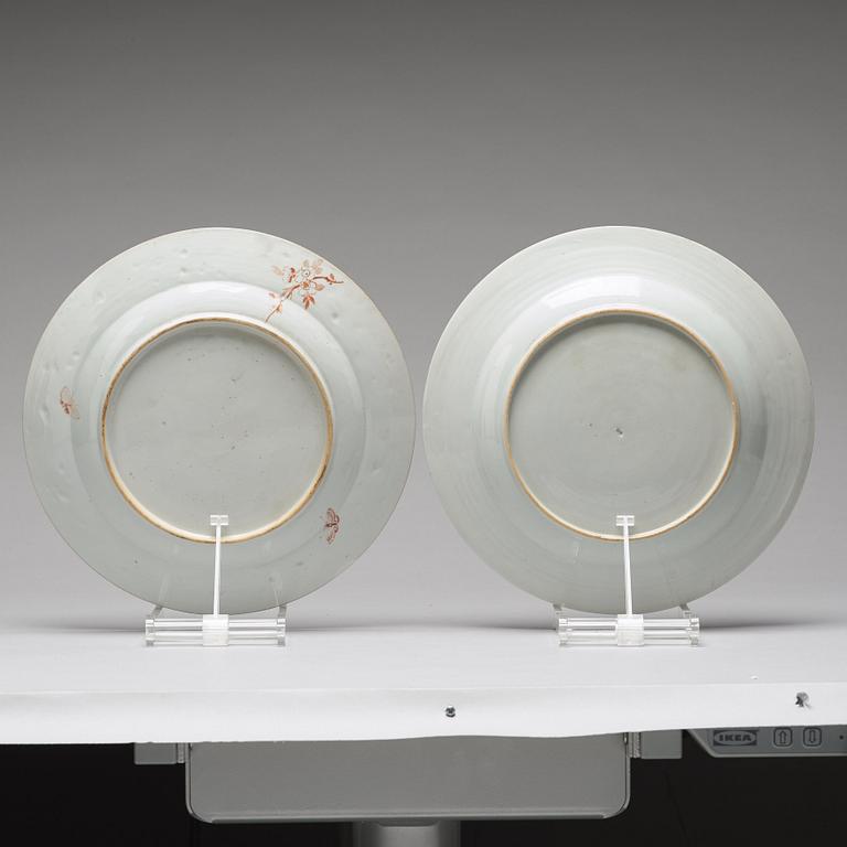 A pair of famille rose 'double peacock' dishes, Qing dynasty, Qianlong (1736-95).