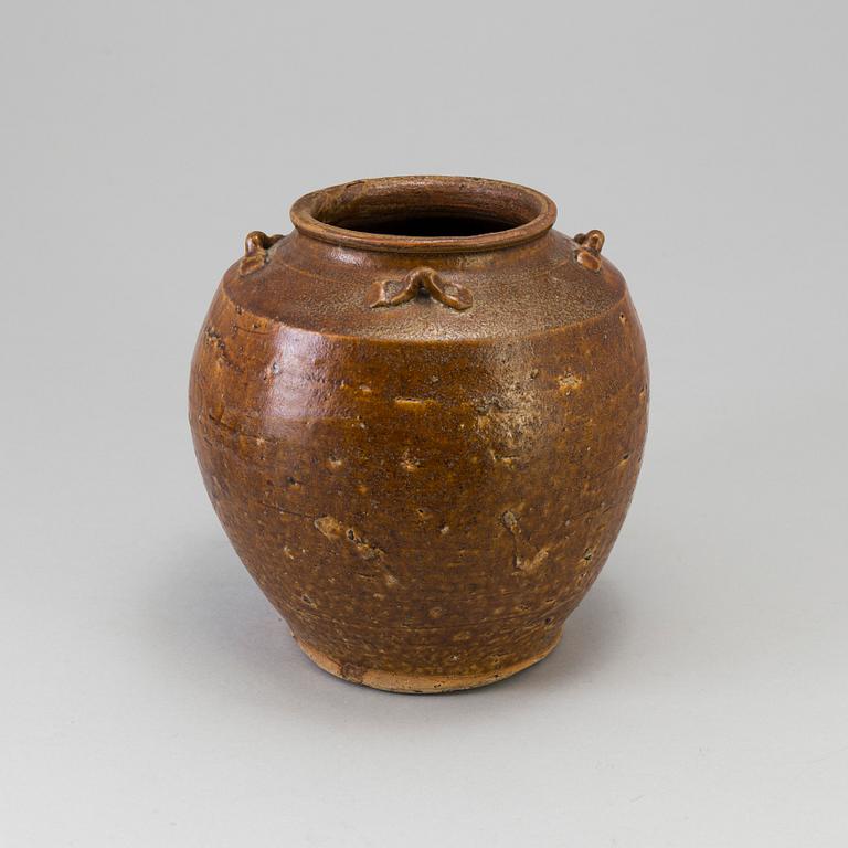 A south east asian pottery urn 18/19th century.