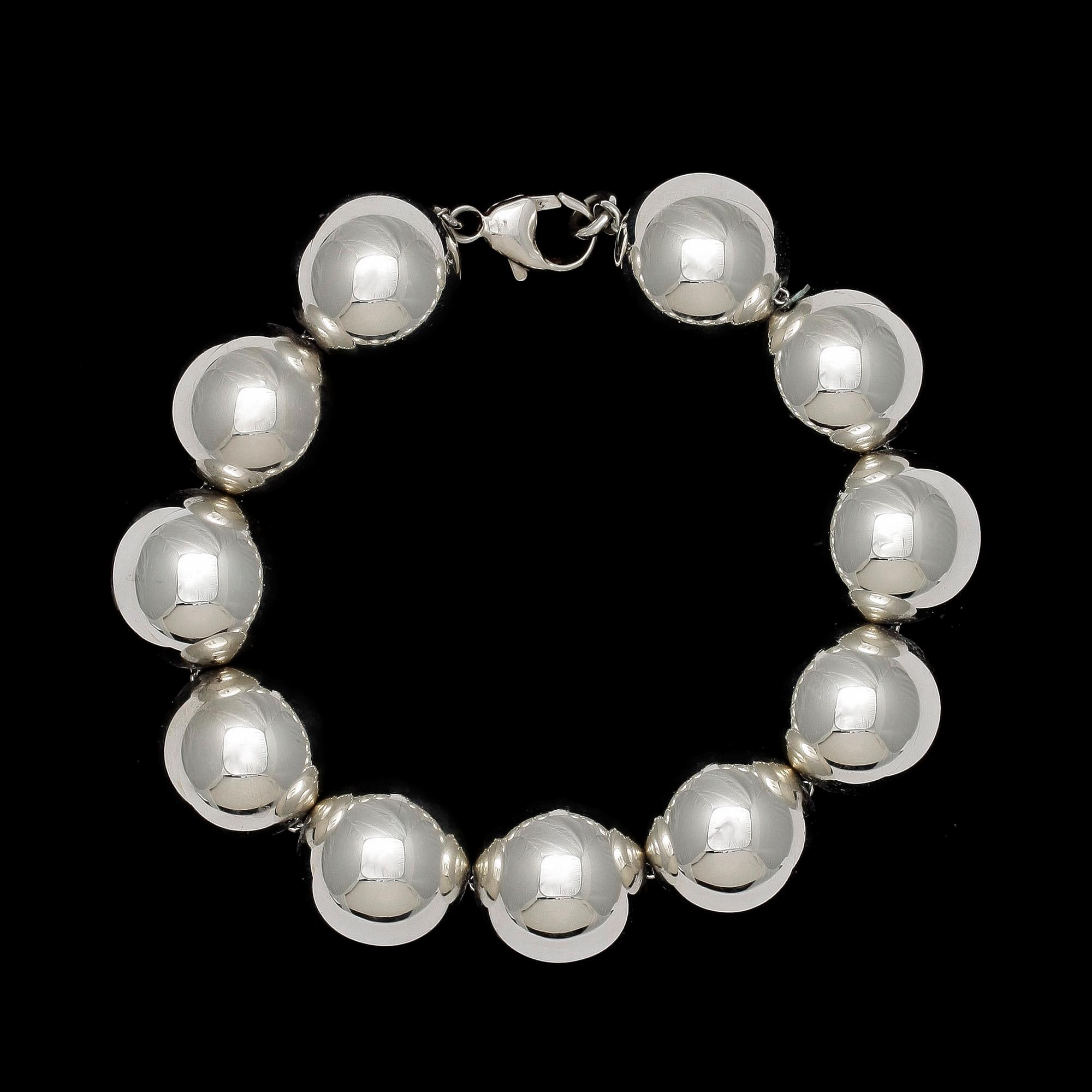 ARMBAND, runda kulor i sterling silver.