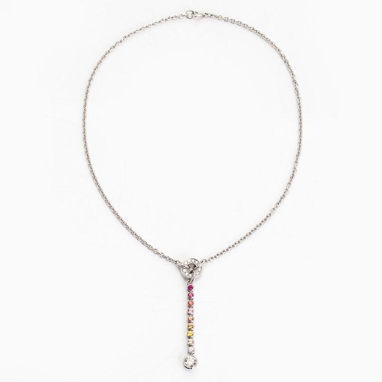 An 18K white gold necklace, set with brilliant-cut diamonds, a ruby, and sapphires. Kultaseppä Kulmala, Helsinki.
