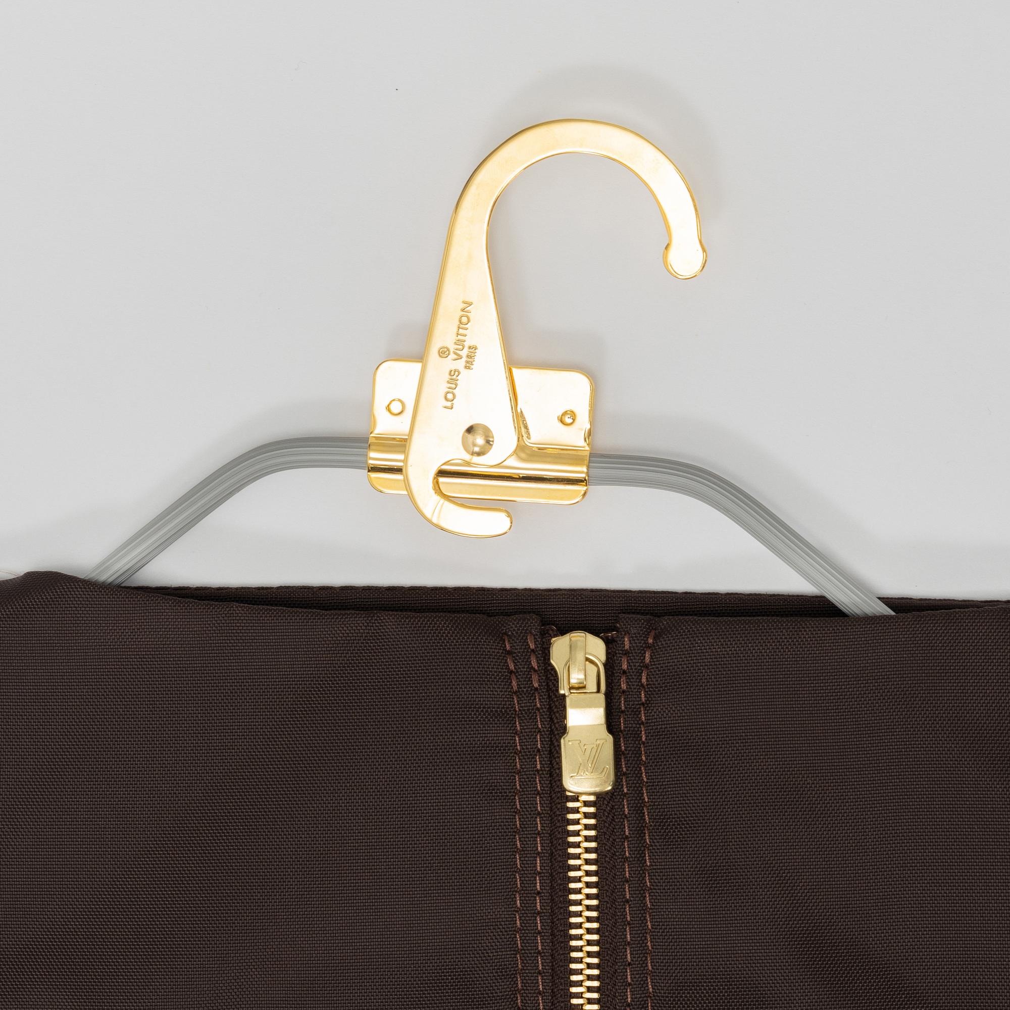 A monogram printed leather "Pegase 45" cabin bag by Louis Vuitton.