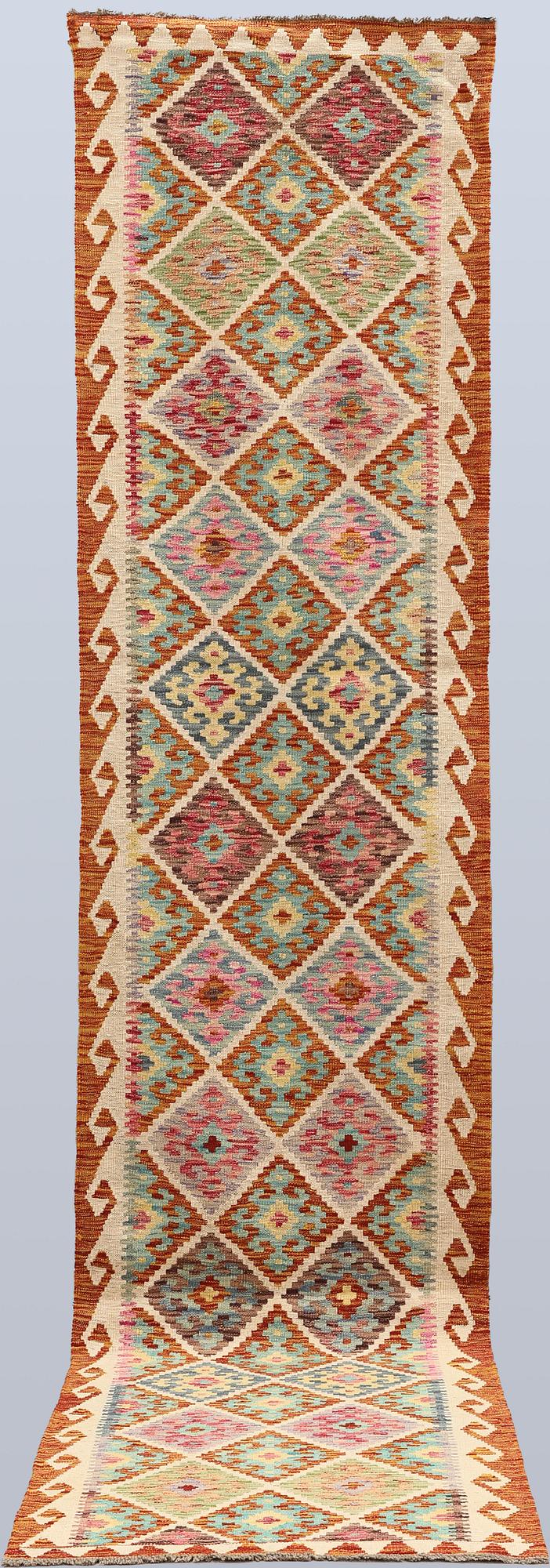 A Kilim runner, approx. 388 x 85 cm.