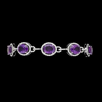 1134. An amethyst and brilliant cut diamond bracelet, tot. 1.64 cts.