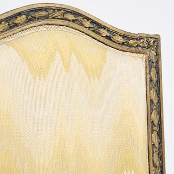 A French Louis XVI chair, late 18th century.