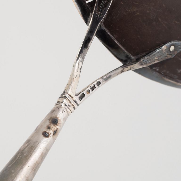 Three soup ladles and one gravy ladle, silver, Visby and Stockholm, Sweden, mid 19th century.