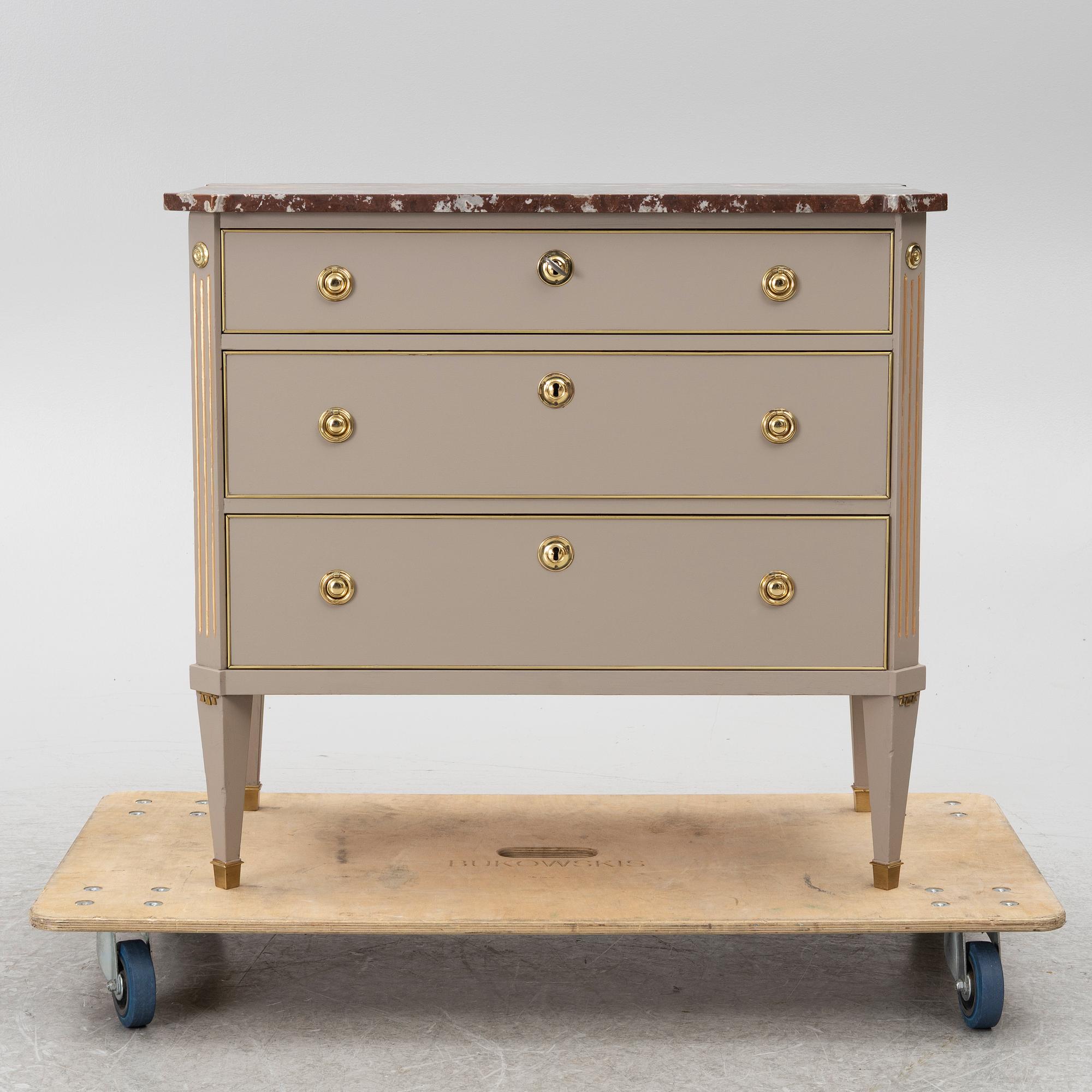 A Gustavian style chest of drawers, Mid 20th Century.