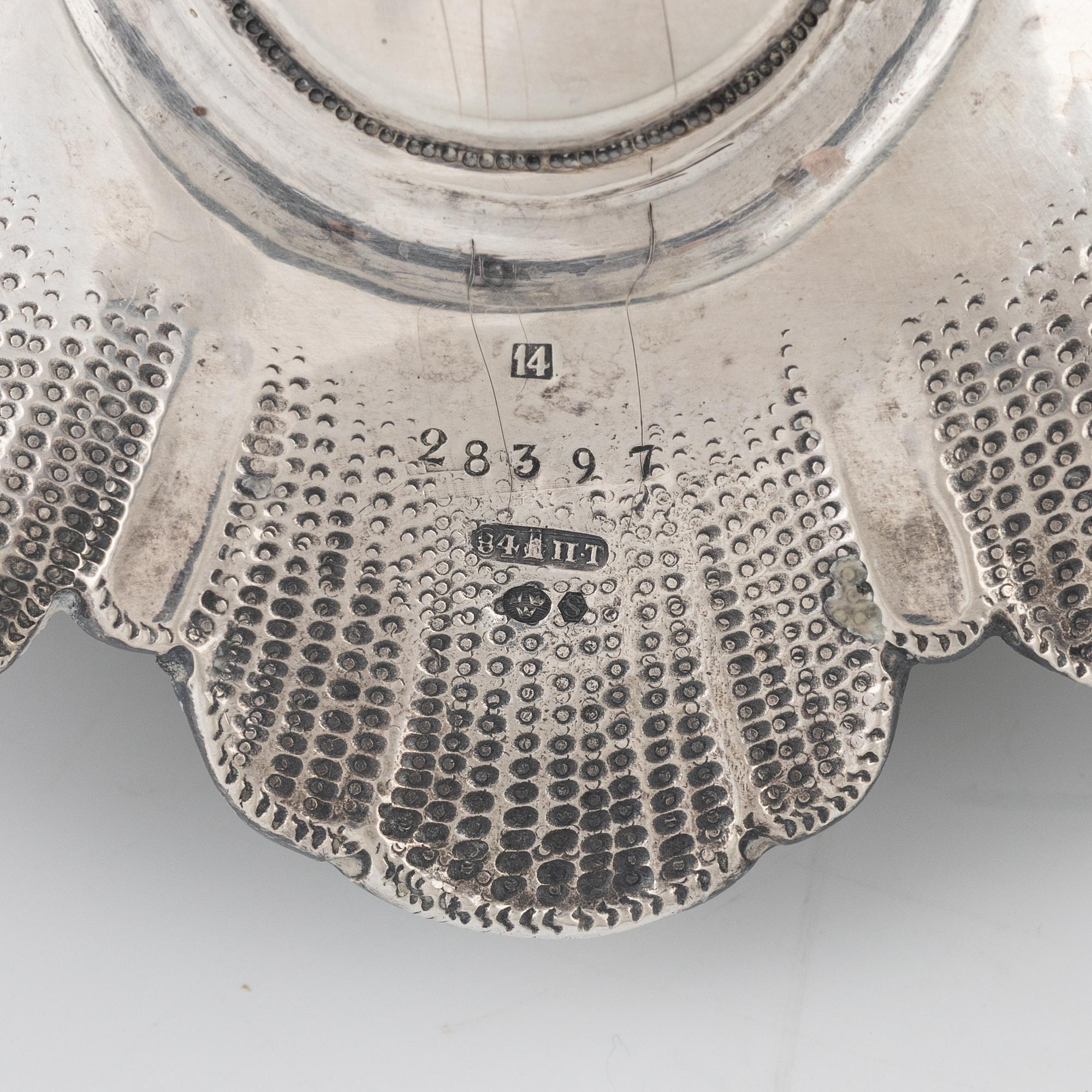 A pair of Russian silver candelabra, with Swedish importmarks, second half of the 20th century.