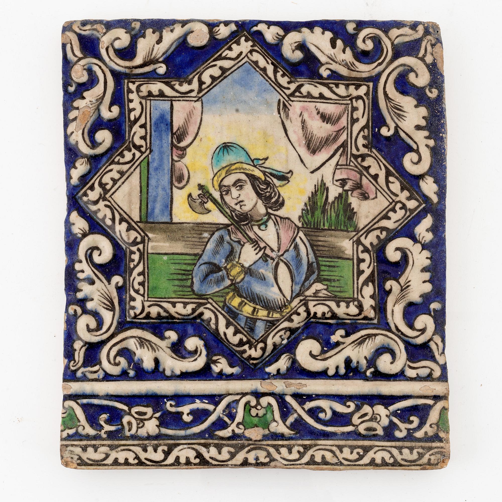 A Persian (Iranian) tile, glazed pottery, Qajar dynasty, 19th century.