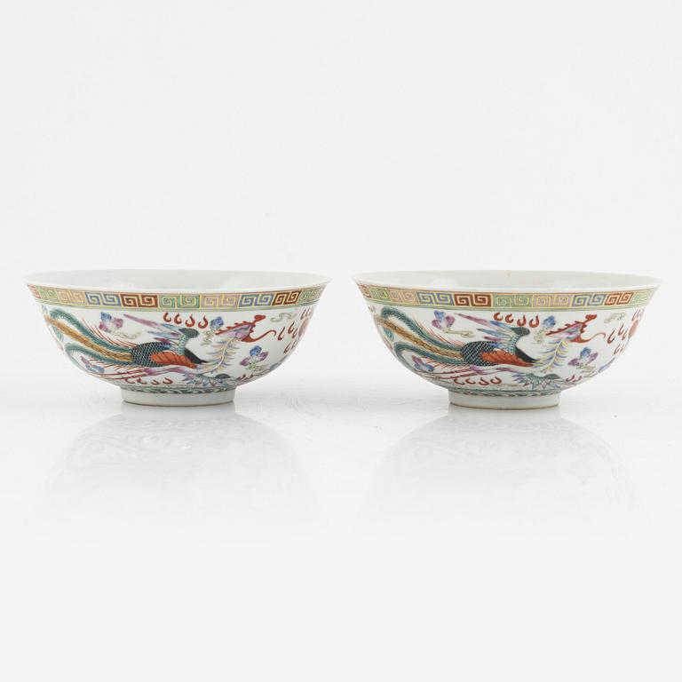 A pair of dragon and phoenix bowls, China, Republic with Qianlong mark.