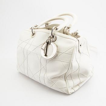 Christian Dior a "Granville Polochon" handbag.