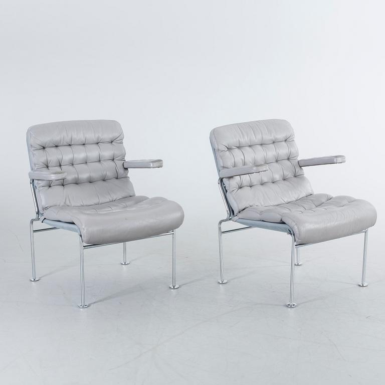 A COUPLE OF BRUNO MATHSSON ARMCHAIRS.