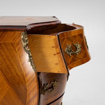 A Rococo style chest of drawers, mid-20th century.