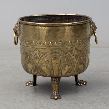 An 18th century brass flower pot.