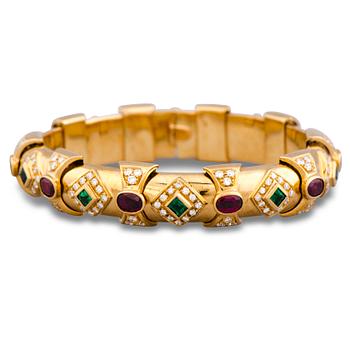 138. A BRACELET, facetted emeralds and rubies, brilliant cut diamonds, 18K gold.
