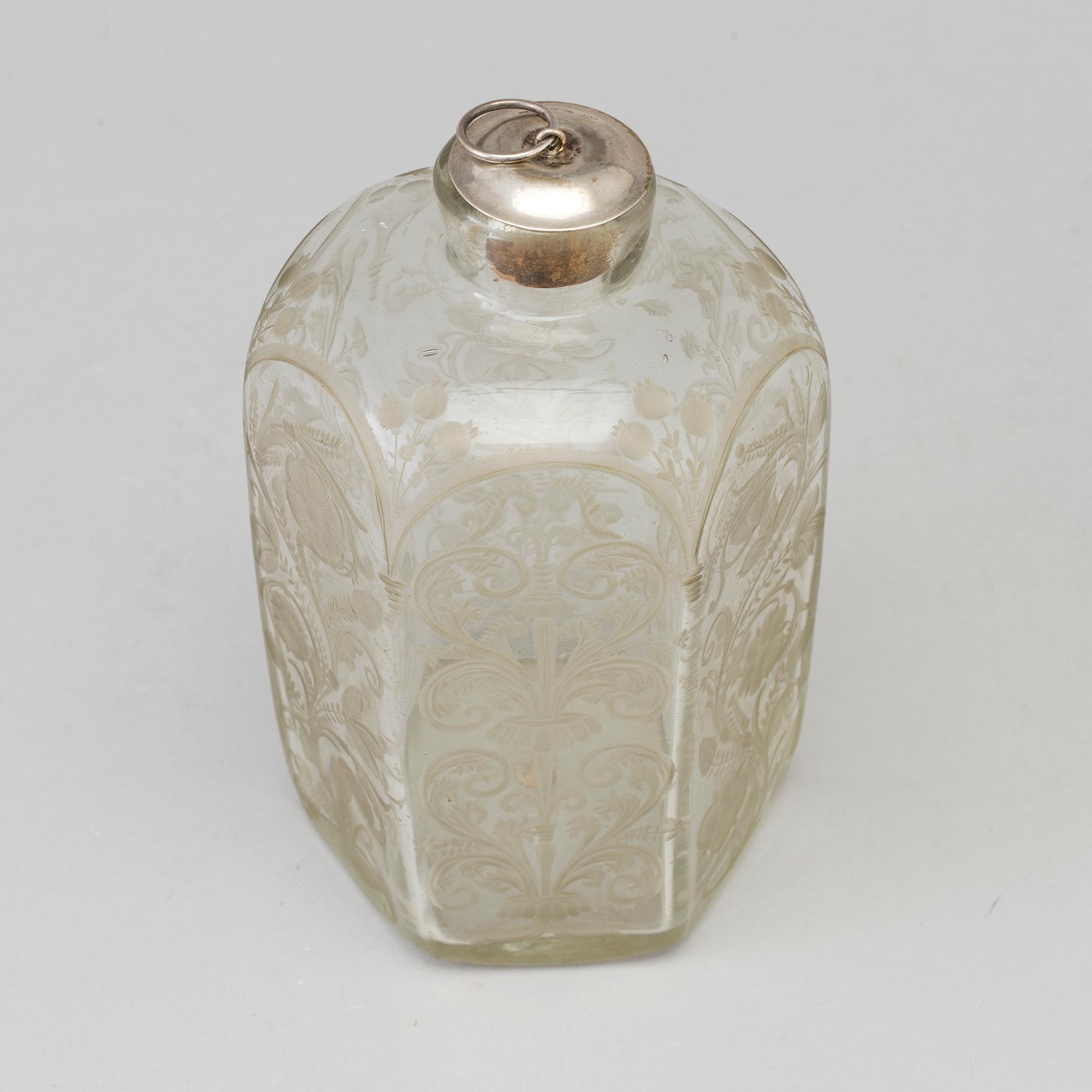 A baroque glass bottle, first half of the 18th century.