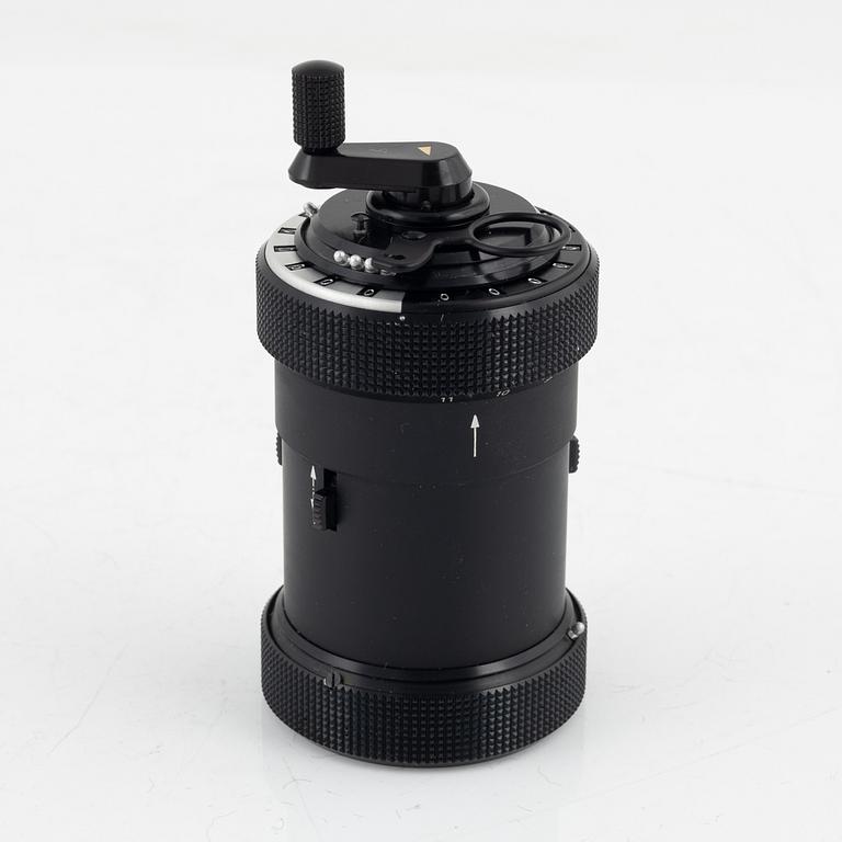 A Curta Type I mechanical calculator.