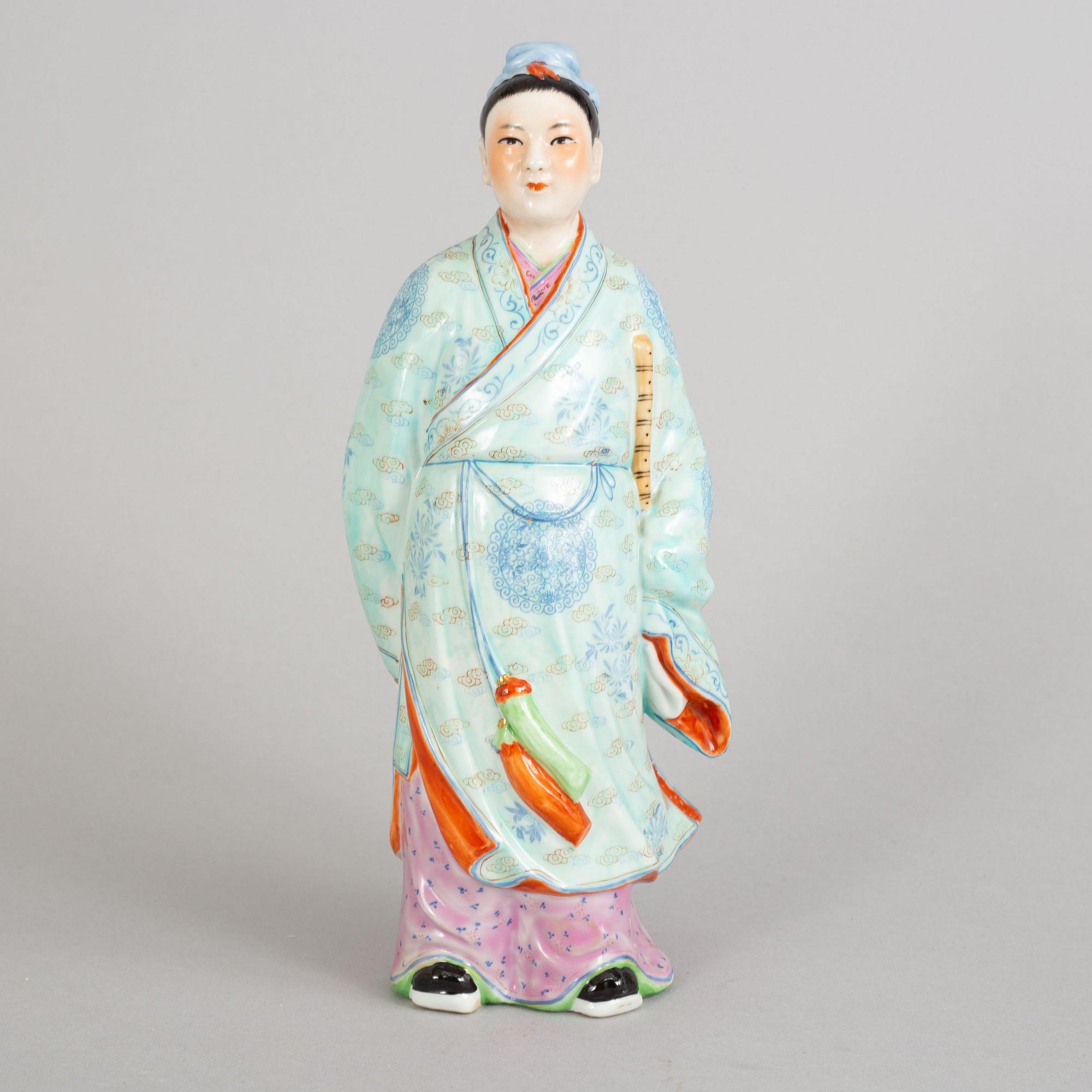 A chinese porcelain figure, 20th Century.