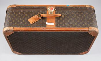 A 1980s monogram canvas suitcase by Louis Vuitton.