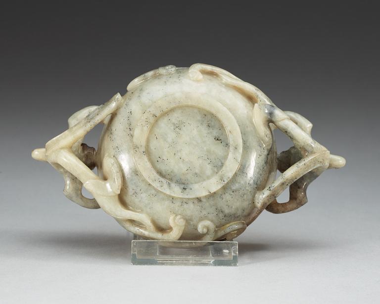 A carved nephrite ceremonial wine cup, late Qing dynasty.