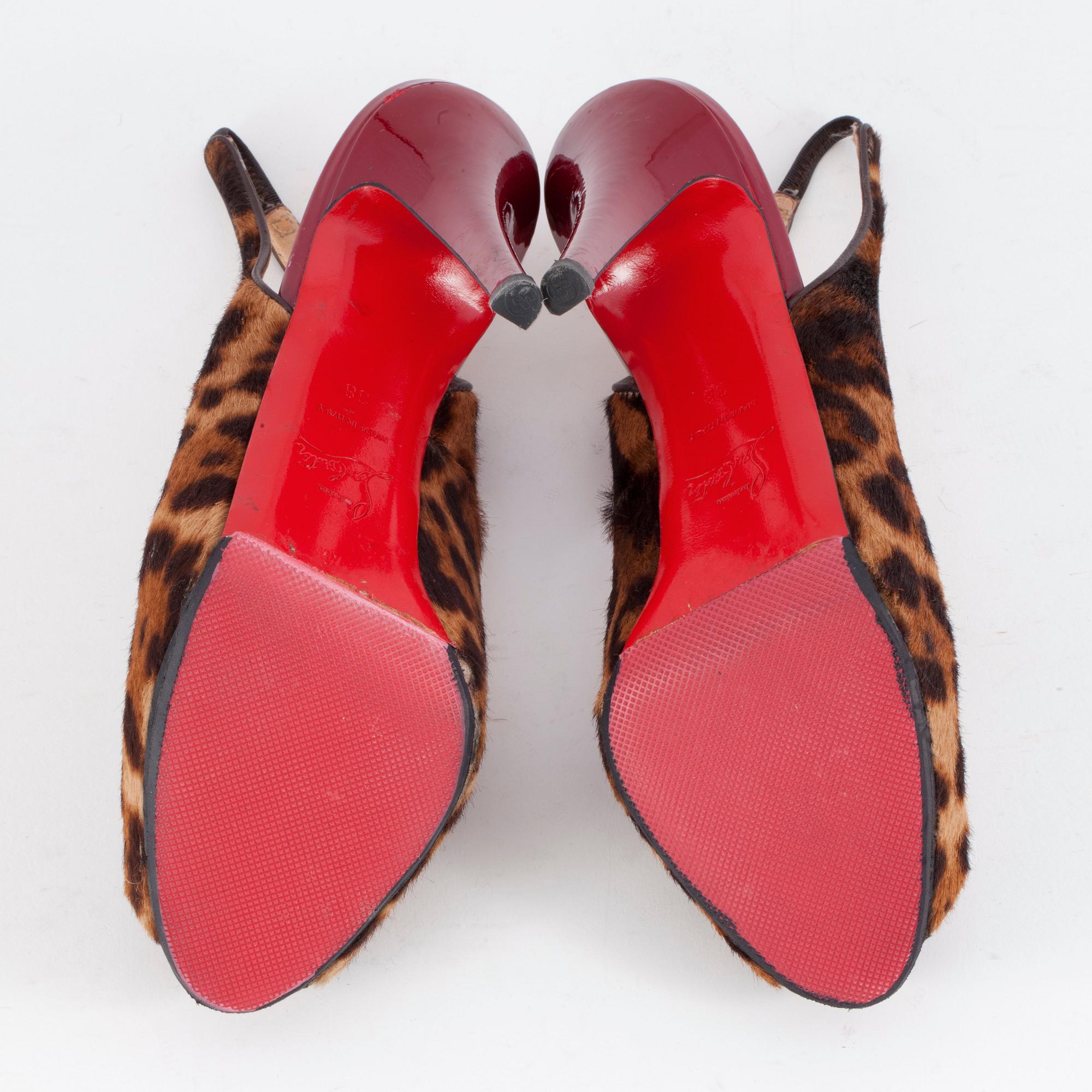 CHRISTIAN LOUBOUTIN, ett par peep-toe skor. Storlek 38.