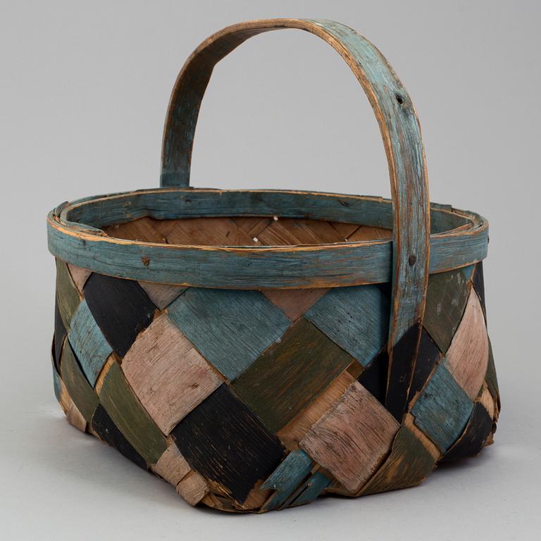 a painted basket from the 19th century.