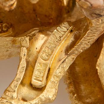 A Tiffany brooch in 18K gold set with sapphires designed as a zebra.