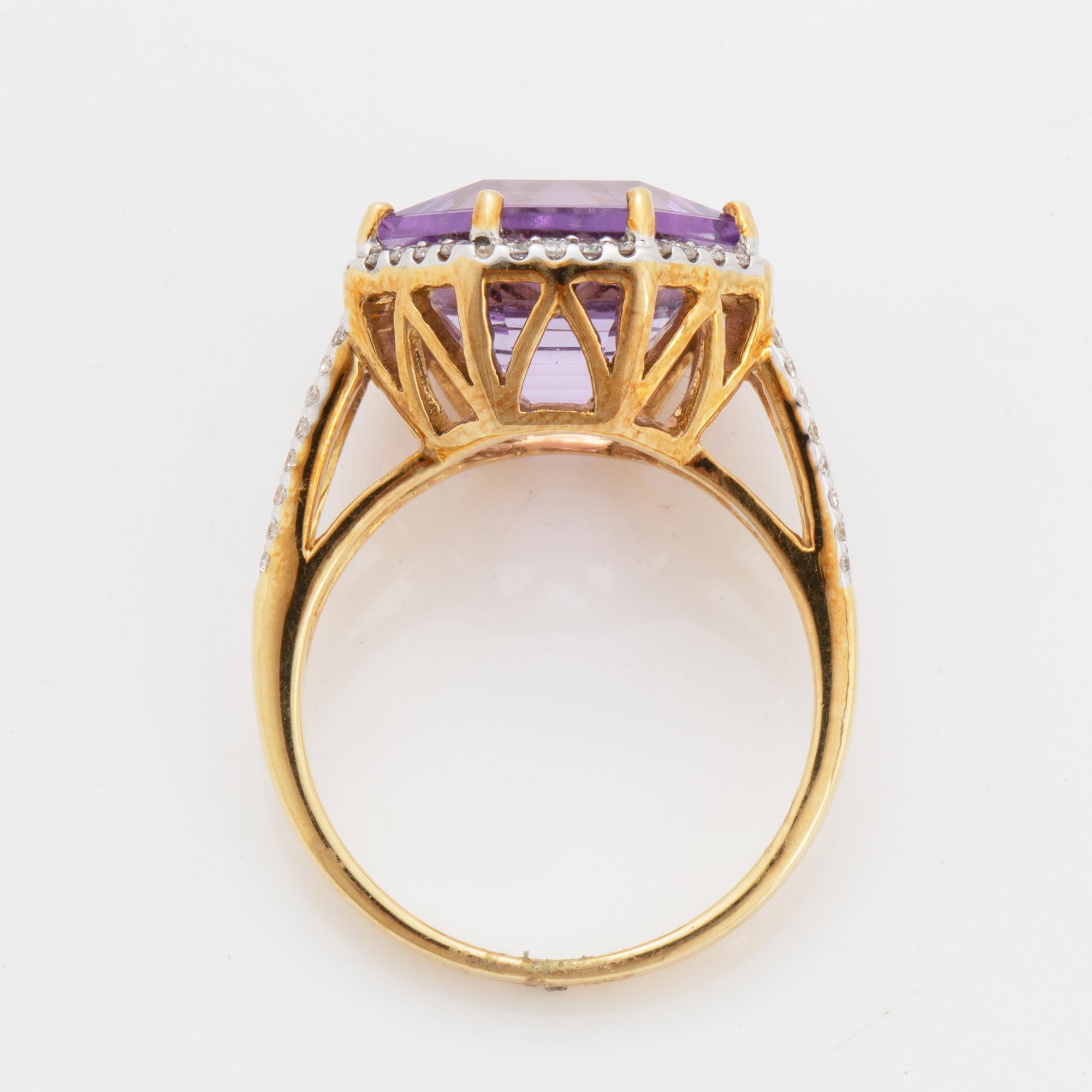 An amethyst ring.