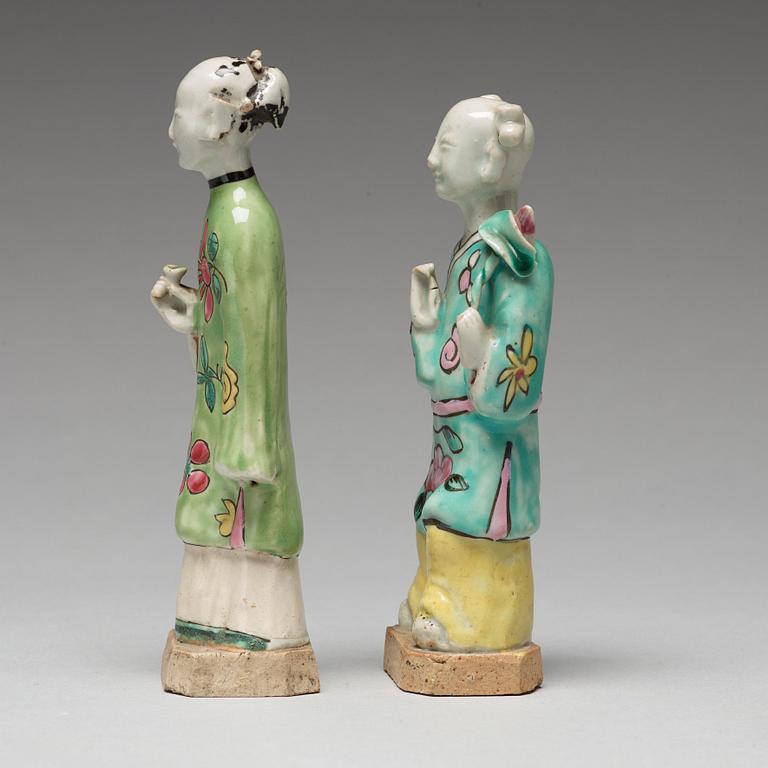 A group of eight famille rose figurines, Qing dynasty, 19th Century.