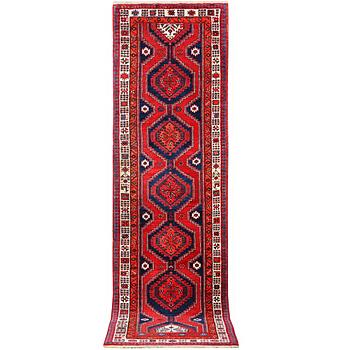 A runner carpet, Ardebil, c. 392 x 103 cm.