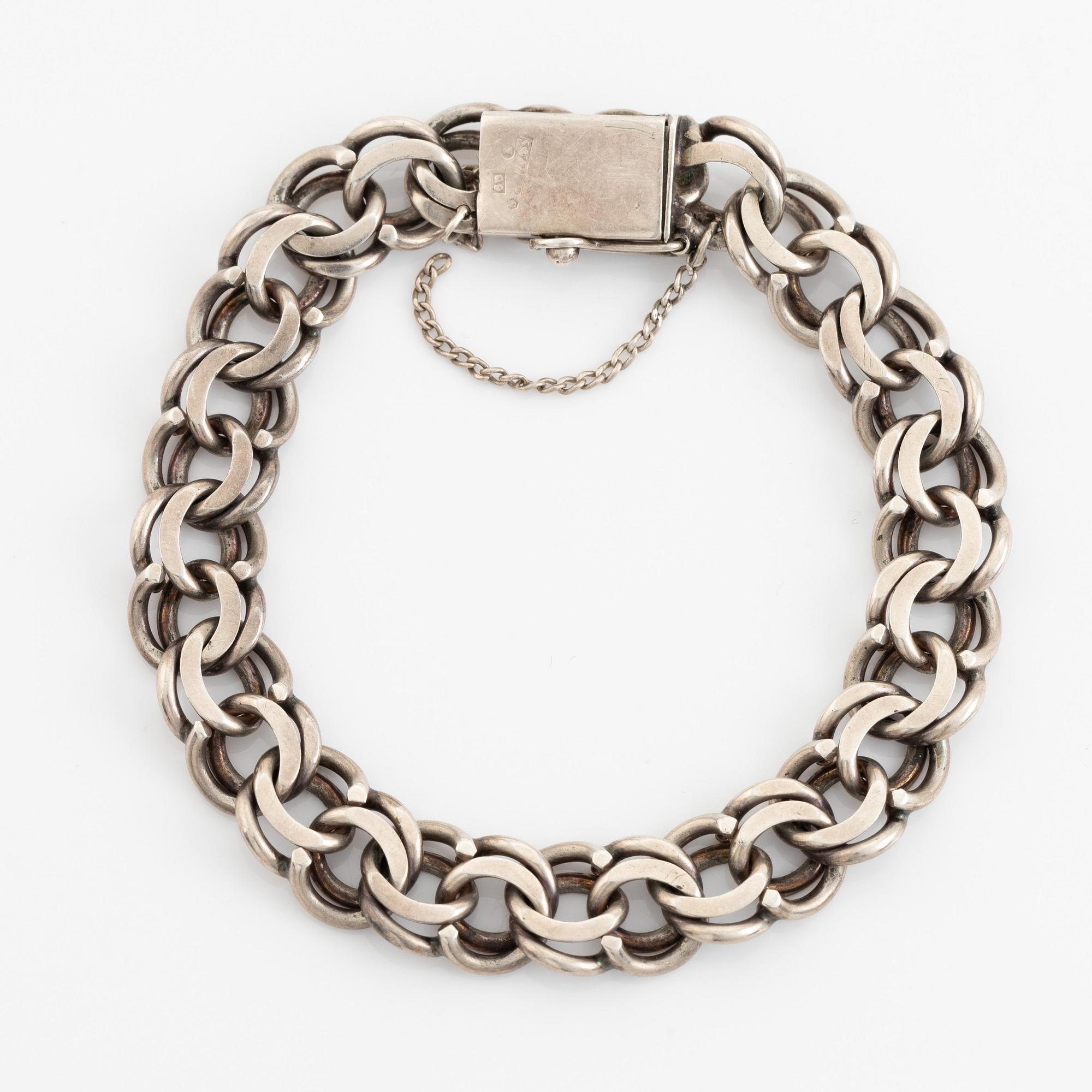 Silver bracelet.