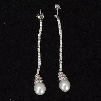 RIIPUS ja KORVAKORUT, hopeaa, zirkoneja, pisaranmuotoiset helmet.