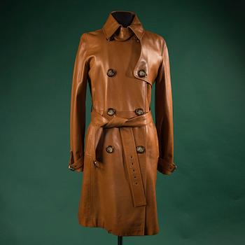 A coat by CELINE, in size 42(FR).