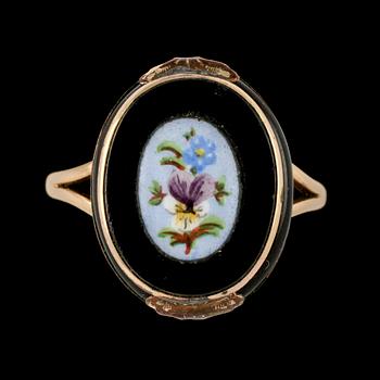 BROSCHNÅL och RING, 18k guld med emalj, 1900-talets första hälft. Vikt 10 g.
