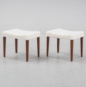 A pair of mahogany stools, mid 20th Century.