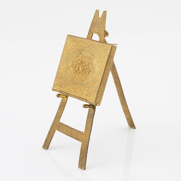 A gilt metal stamp holder, W. Avery & Son, Redditch, England, late 19th Century.