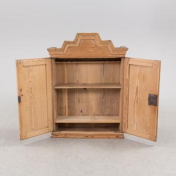 A first half of the 19th century cabinet.