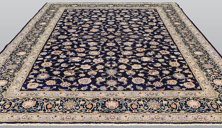 A Keshan carpet, approx. 418 x 311 cm.