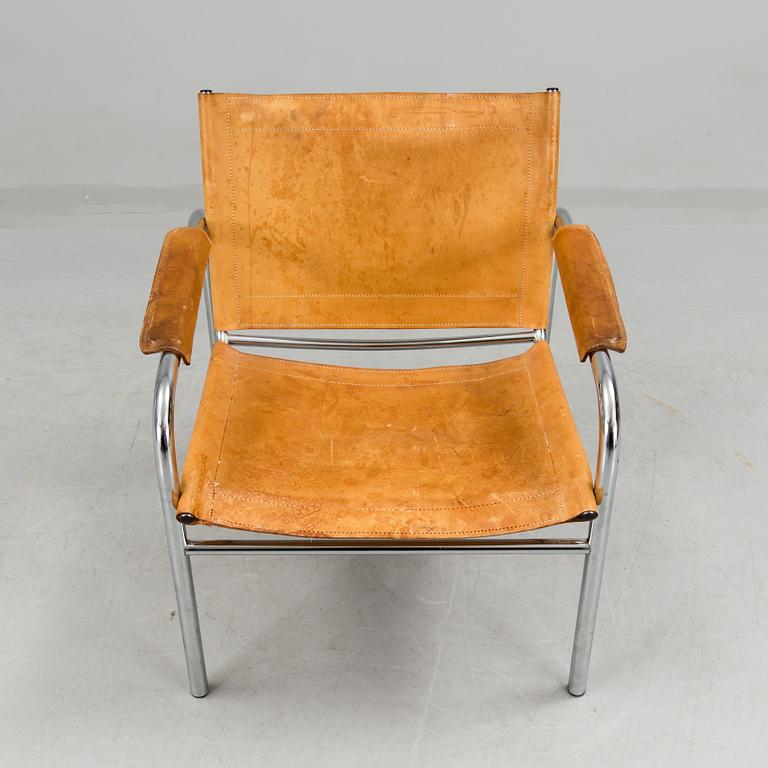 a leather and metal armchair, probably by IKEA.