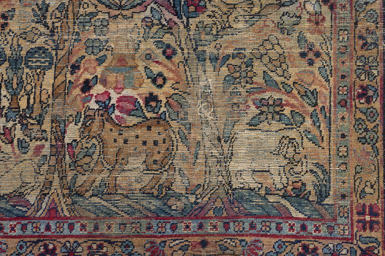 A semi-antique Kerman carpet, c. 325 x 203 cm.